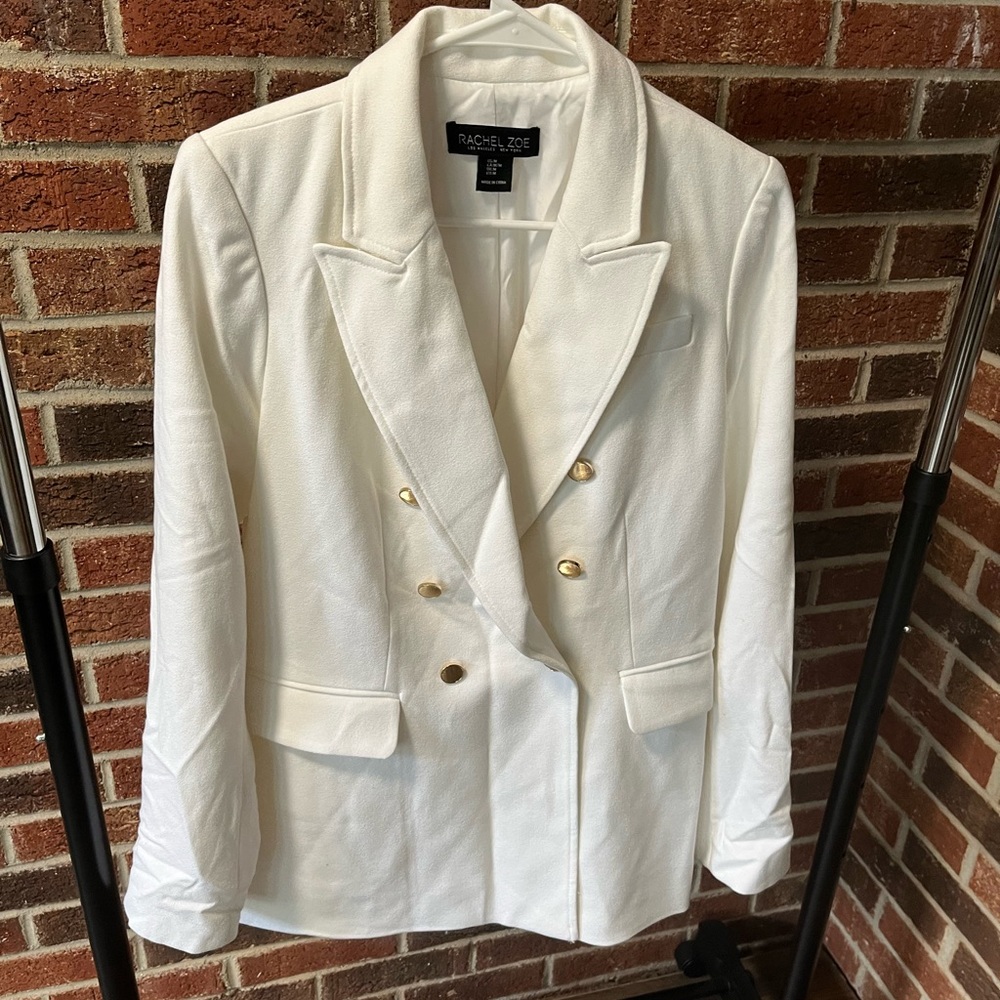 Woman’s white blazer w/ gold buttons. Like new!